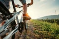 Boy feet in red sneackers on bicycle pedal close up image