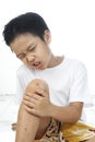 Boy fell pain from his wound on knee Royalty Free Stock Photo