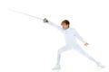 Boy fencer standing in attacking pose