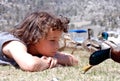 Boy field of ducks making face Royalty Free Stock Photo