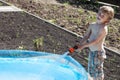 Boy fills up with water