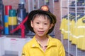 Boy in firefighter uniform Royalty Free Stock Photo