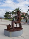 Boy Fishing with a Bucket Sculpture