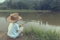 Chinese kid with fishing rod 