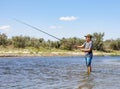 A Boy Fishing in the Danube Royalty Free Stock Photo