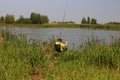 Boy fishing on the lake.