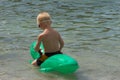 Boy & float Royalty Free Stock Photo