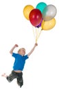 Boy Flying Behind Balloons