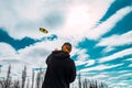 Boy flying big kite on windy day Royalty Free Stock Photo