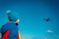 Boy flying drone in nature, modern toys for kids Royalty Free Stock Photo