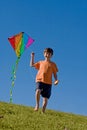 Boy Flying a Kite Royalty Free Stock Photo