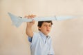 Boy flying paper rocket Royalty Free Stock Photo