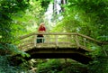 Boy on a Footbridge Royalty Free Stock Photo