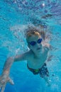 Boy freestyle swimming Royalty Free Stock Photo