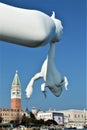 Boy with frog statue in Punta della Dogana, Venice city, Italy. Art, creativity, imagination and tourism