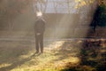 Boy on frosty morning in park Royalty Free Stock Photo