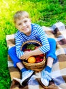 Boy with fruit outdoor Royalty Free Stock Photo