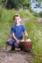 Boy with full herbs flower basket on way