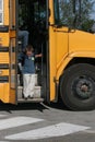 Boy getting off the school bus Royalty Free Stock Photo