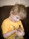 Boy and Giant African landsnail Royalty Free Stock Photo