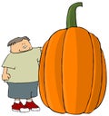 Boy With A Giant Pumpkin Royalty Free Stock Photo