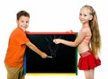 Boy and girl with a board Royalty Free Stock Photo