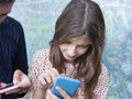 Children Busy With Mobile Phones