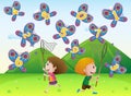 Boy and girl catching butterflies with numbers