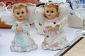 Boy and girl cherub statuettes flea market Royalty Free Stock Photo