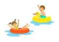 Boy and girl, children floating on inflatable rings Royalty Free Stock Photo