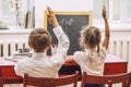 Boy and girl children in the school has a happy Royalty Free Stock Photo