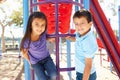 Boy And Girl On Climbing Frame In Park Royalty Free Stock Photo