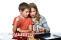 Boy and girl are considering coin collection isolated Royalty Free Stock Photo