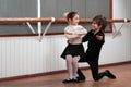 Children dancing in a ballet barre