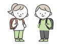 Boy and girl elementary school students carrying school bags Royalty Free Stock Photo