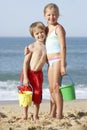 Boy And Girl Enjoying Beach Holiday Royalty Free Stock Photo