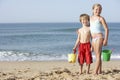 Boy And Girl Enjoying Beach Holiday Royalty Free Stock Photo