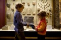 Boy and girl at excursion in historical museum Royalty Free Stock Photo