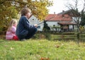 Boy and girl fishing on pond Royalty Free Stock Photo