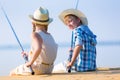 Boy and girl with fishing rods Royalty Free Stock Photo