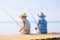 Boy and girl with fishing rods Royalty Free Stock Photo