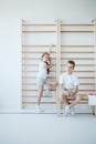 Boy and girl at the gym hall Royalty Free Stock Photo