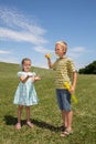 Boy and Girl Having Fun With Bubbles Royalty Free Stock Photo