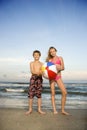 Boy and girl holding ball Royalty Free Stock Photo