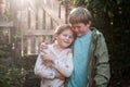 Boy and girl hug each other, happy brother and sister stay together. Children play outdoors in summer, best friends Royalty Free Stock Photo