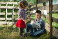 Boy and girl with lamb on the farm Royalty Free Stock Photo