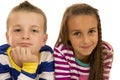 A boy and girl laying down for a casual portrait Royalty Free Stock Photo