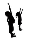 A boy and a girl looking up, silhouette vector