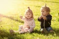 Boy and girl pick flowers on green grass Royalty Free Stock Photo