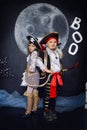 Boy and girl in pirate costumes. Halloween Concept Royalty Free Stock Photo